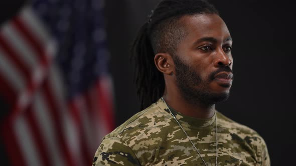 Unshaved Confident Serious African American Soldier Looking Away and Turning to Camera alt