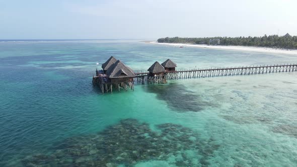 House on Stilts in the Ocean on the Coast of Zanzibar Tanzania alt