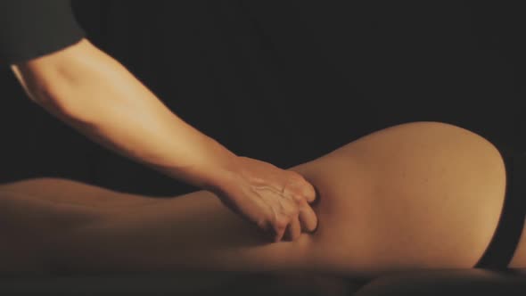 Beautiful Young Woman Gets a Relaxing Massage