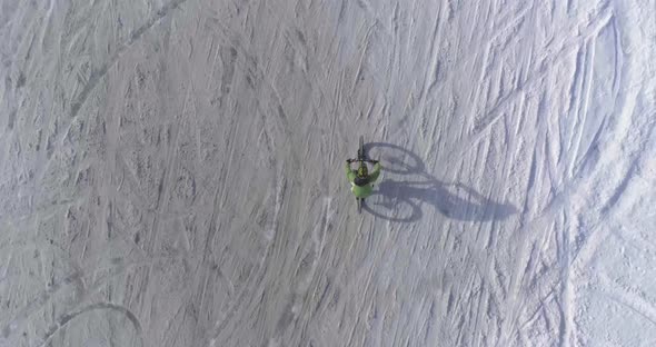 Overhead Aerial Over Biker Man Cycling on Snowy Path During Winter with Mtb Ebike