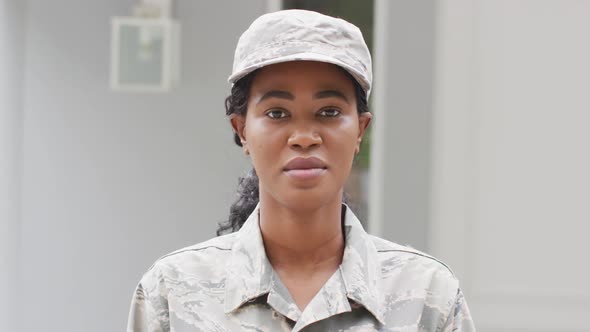 Animation of african american female soldier looking at camera alt