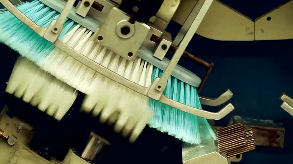 Brush Making Machine. Close Up. alt