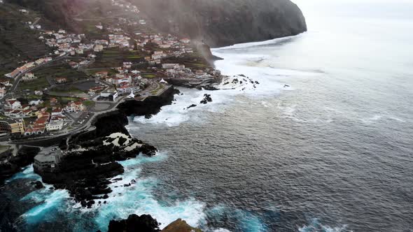 Aerial Unveil Shot of Porto Moniz Town, Madeira Island, Portugal