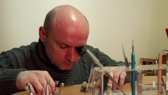 Clockmaker Begins His Work alt