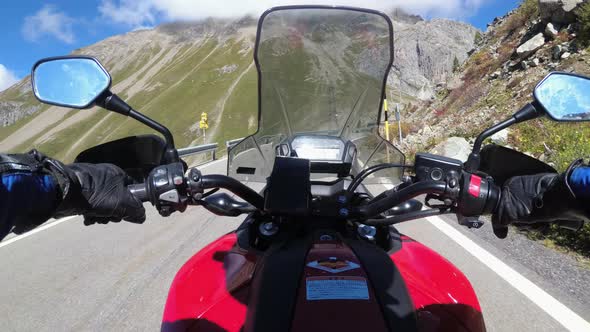 POV Biker Rides on Motorbike By Scenic Mountain Pass in Swiss Alps Moto Trip alt