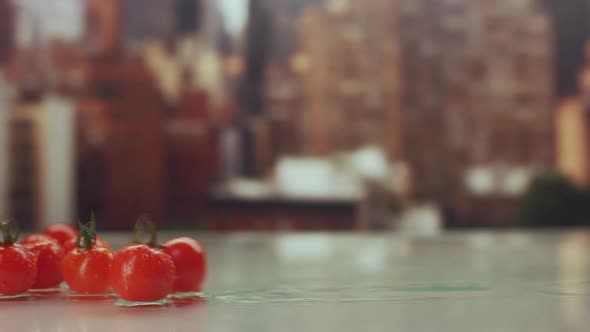 Food Footage of Fresh Natural Tomatoes on Table in Restaurant Over Colorful Blurry Background in alt
