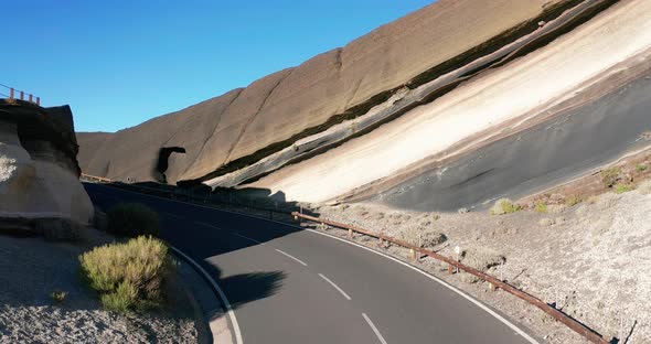 Aerial Shot. Looking Down. Car Go New Ideally Flat Asphalt Road, Fresh White Road Markings alt