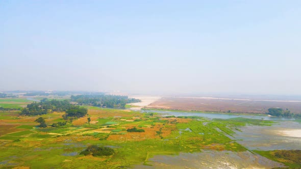 Aerial view of paddy fields in the wetlands of Bangladesh. alt