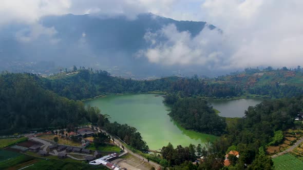 Volcanic Telaga Warna lake in Dieng plateau, Java, Indonesia, aerial panorama alt