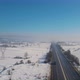 Cars driving down the snowy highway - VideoHive Item for Sale