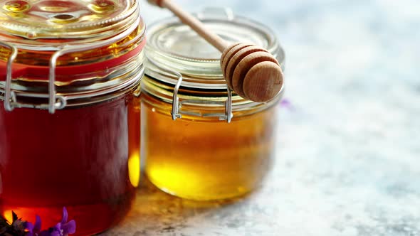 Jars with Different Kinds of Fresh Organic Honey alt