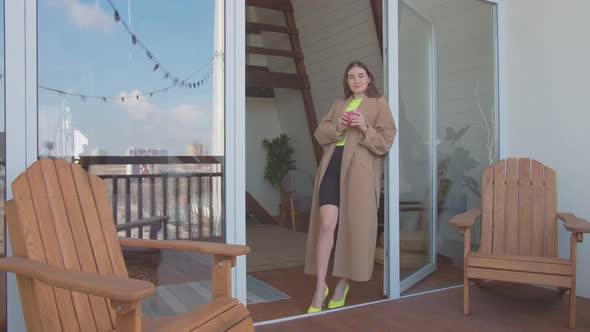 Flexible Woman Doing Standing Splits in Morning alt