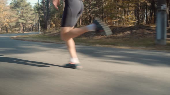 Running Man On Road Half Marathon. Triathlete Jogger Ready For Marathon And Hard Training Workout. alt