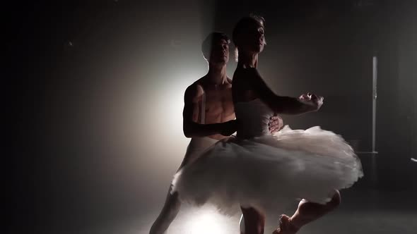 Professional Ballet Couple Dancing in Spotlights Smoke on Big Stage. Beautiful Young Woman and Man alt