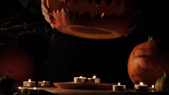 Carved Halloween Pumpkin Lights Inside with Flame