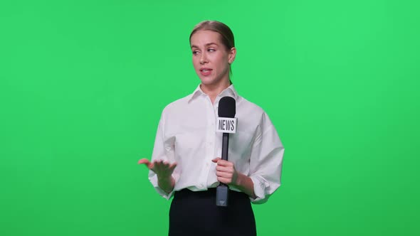 Female Reporter Looks Into the Camera and Speaks Into a Microphone on a Green Background Template alt
