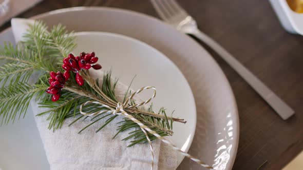 Decorated Linen Napkin on Plate on Christmas Table alt