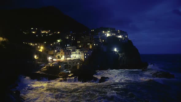 Exciting Night View of Lights in Manarola Village in Italy, Cinque Terre Islands alt