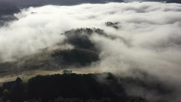 Fog Clouds and Mountains Aerial View