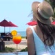 Beautiful Girl in Swimwear Drinking Colorful Yummy Cocktail at Swimming Pool - VideoHive Item for Sale