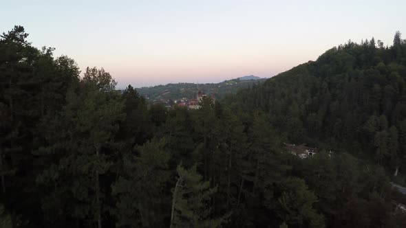 Aerial view of forested hill near Bran Castle