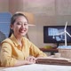Woman Smile To Camera While Working With A Blueprint And The Model Of A Small House With Solar Panel - VideoHive Item for Sale