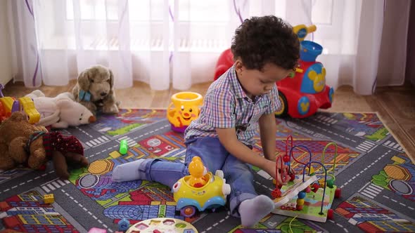 Boy Playing With Toys By Vovdon VideoHive