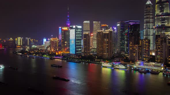 Shanghai River Urban Cityscape Aerial Skyline Panorama Timelapse at Night Zoom Out alt