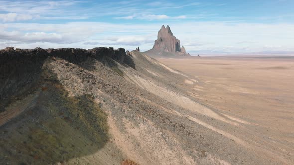 Endless Vast Desert Around Ship Rock Formation As Seen From Above alt