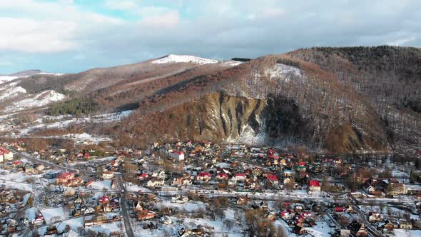 Aerial View of a Village in the Carpathian Mountains in Winter. Yaremche, Ukraine. alt