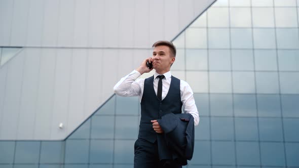 Young Man in Suit Full of Happiness Enjoying Great News About His Business Deal Outdoor alt