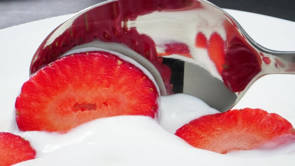 Spoon in Yogurt with Strawberries alt