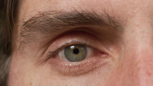 Close up of a Caucasian man eye alt