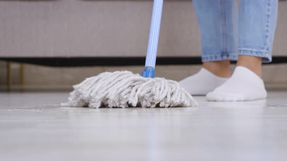Housewife Washing Floor with Mop Everyday Home Cleaning Close Up Slow Motion alt