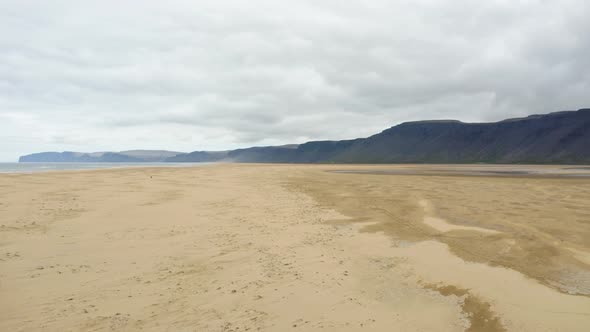 Raudisandur. Panoramic Drone View Of A Golden Sandy Beach In Iceland. aerial alt