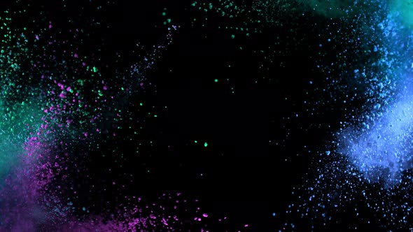 Super Slow Motion Shot of Color Powder Explosion Isolated on Black Background at 1000Fps alt
