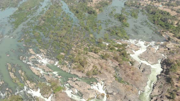 Aerial: flying over Don Det and the 4000 islands Mekong River in Laos alt