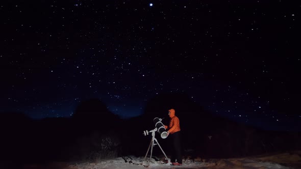 Experienced Amateur Astronomer Adjusts His Professional Large Newtonian Reflecting Telescope alt