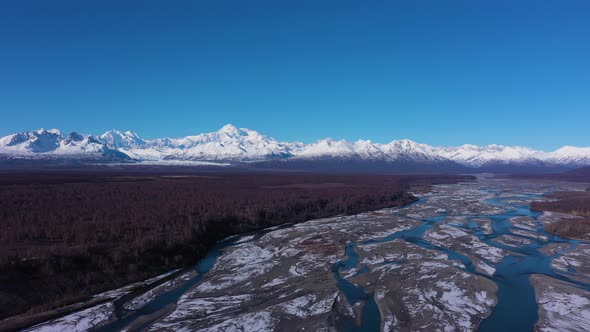 Mount Denali and Chulitna River on Winter Sunny Day alt