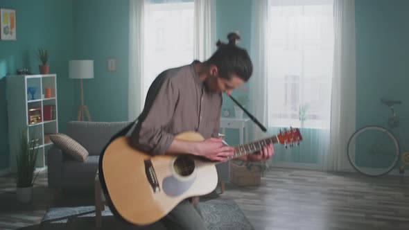 Young Man Has Fun at Home alt