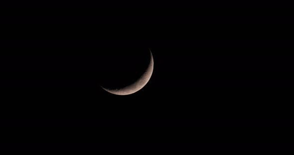 Crescent Moon White Colour Isolated In Black Night Sky