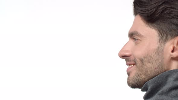 Slowmotion Closeup Profile of Confident Male with Bristle Looking Left Start Smiling Happy Sincere alt