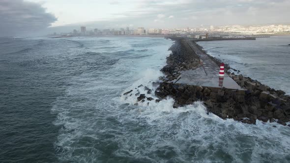 Storm at Sea, Winds, Big Waves Hit Pier in Portugal alt