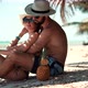 Tropical Vacation Resort.Loving Couple On Tropical Beach.Happy Romantic Couple Relaxing On Bahamas  - VideoHive Item for Sale