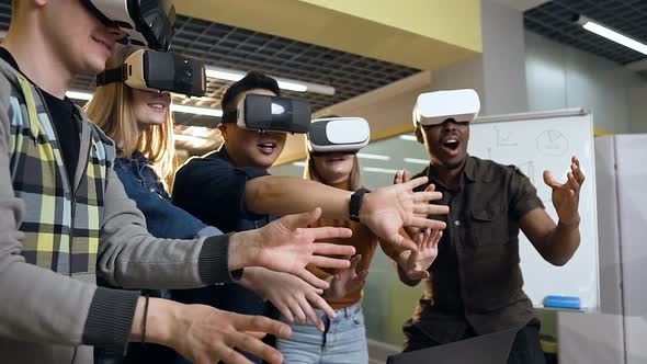 Multi Ethnic Hipster Group Having Fun Using VR Virtual Reality Glasses alt