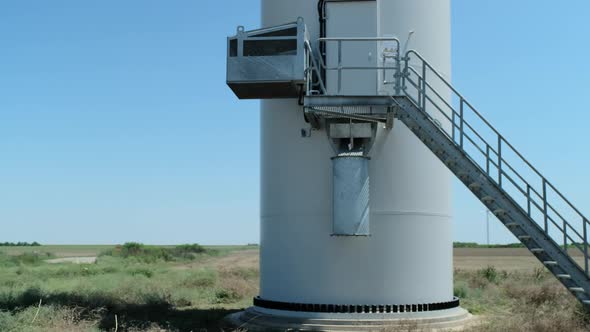 Entrance to Tower of Wind Turbine with Stairs and Door
