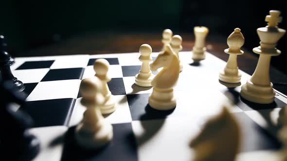 White and black pieces on a chess board