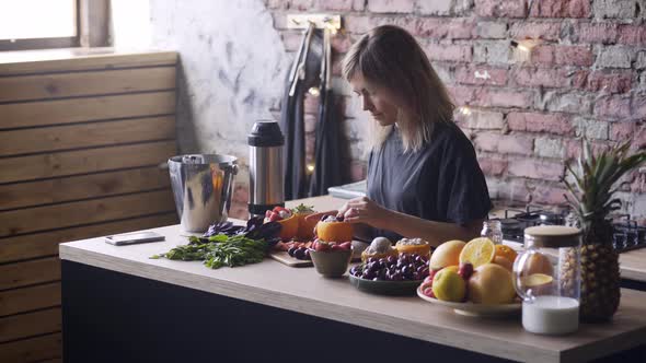 Young Woman with Fair Hair Prepares Tasty Icecream Dessert