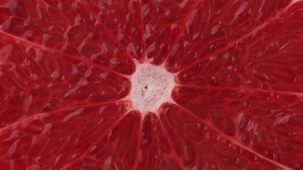 Red grapefruit closeup, rotate. healthy food concept, vitamin source. alt