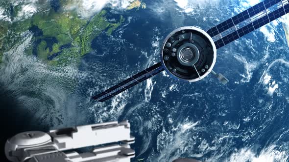 artificial satellite of the earth. a satellite flying in space over the globe alt